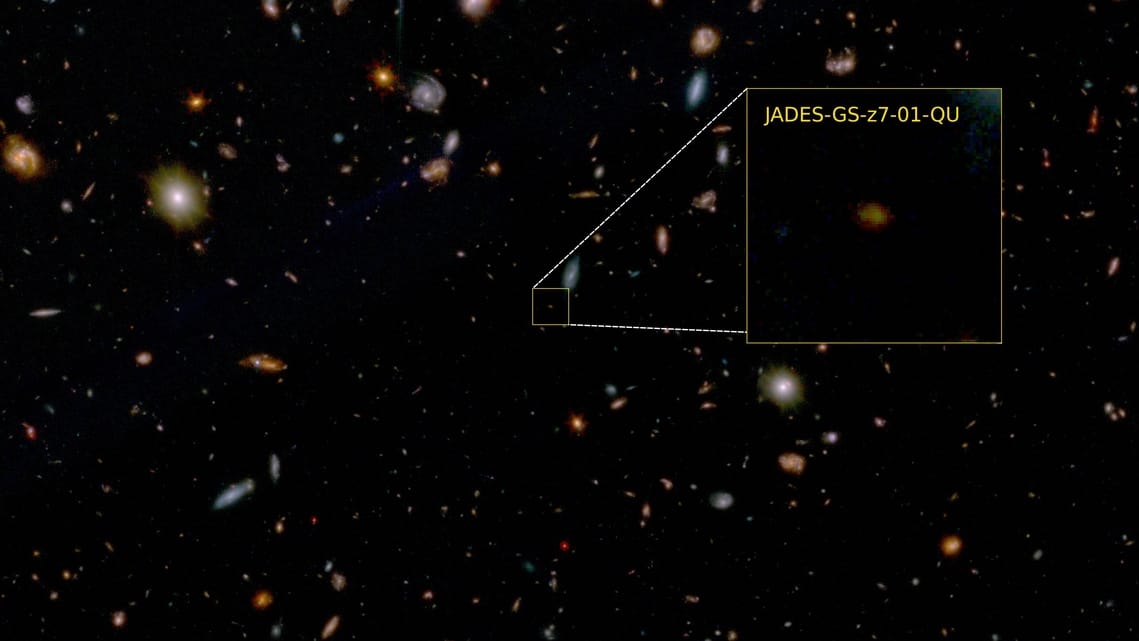 A false-color image obtained by the James Webb Space Telescope (JWST) shows the galaxy JADES-GS-z7-01-QU, the universe