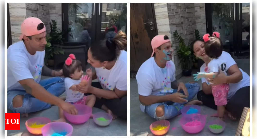 Bipasha Basu and Karan Singh Grover drench in Holi colors with daughter Devi; watch video | – Times of India