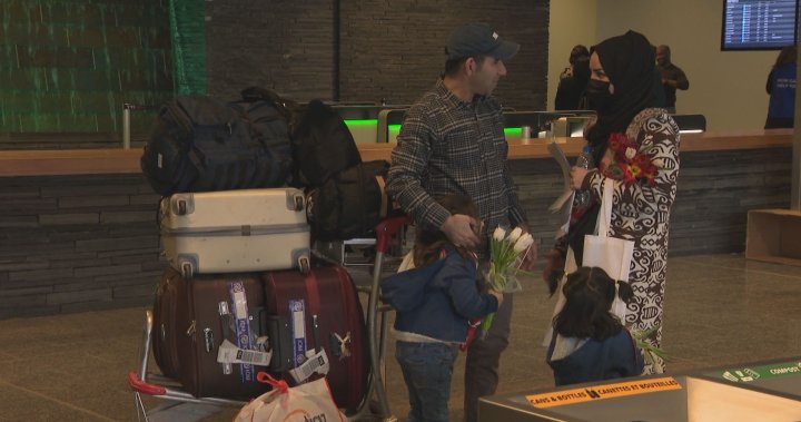 Calgary airport hosts tearful reunion for Afghan refugees: ‘My family is free’  | Globalnews.ca