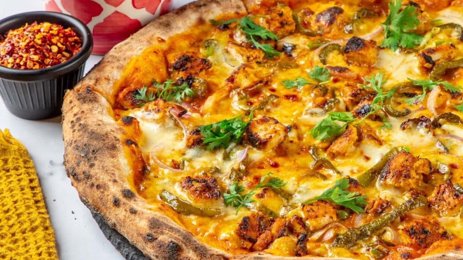 This Ramadan, bring zesty twist to your iftar table with delicious Chicken Tikka Pizza | Recipe inside