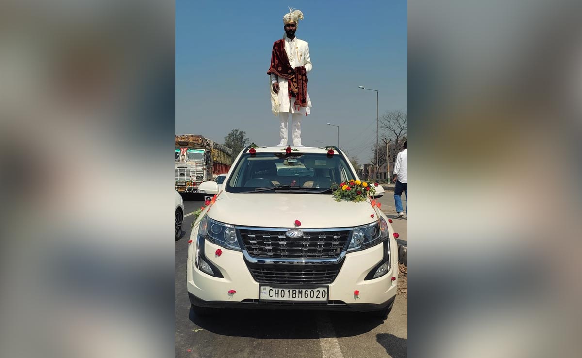 UP Groom Plays Statue Standing On A Car, Police Say Over