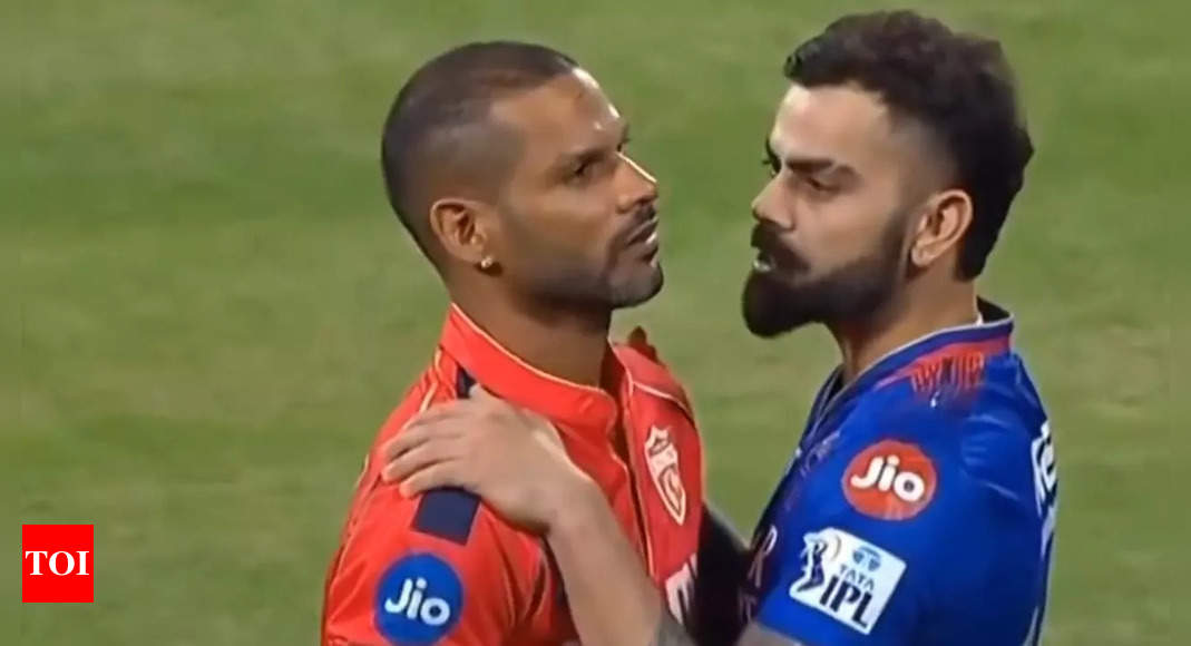 Watch: Virat Kohli hugs an emotional Shikhar Dhawan in a heartwarming gesture | Cricket News – Times of India