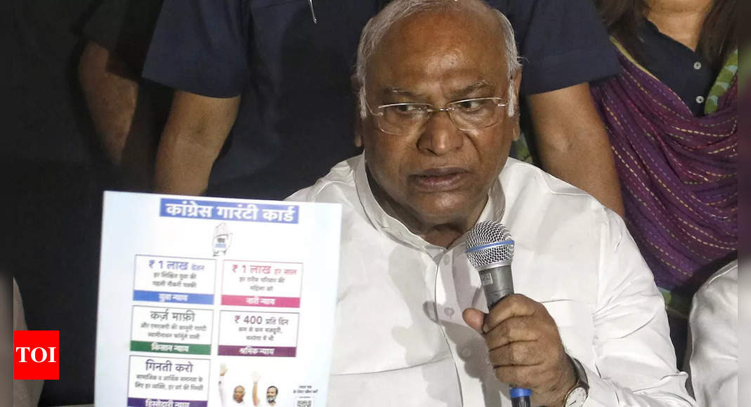 Mallikarjun Kharge launches Cong’s ‘Ghar Ghar Guarantee’ initiative, takes a dig at PM’s ‘Modi ki guarantee’ | India News – Times of India