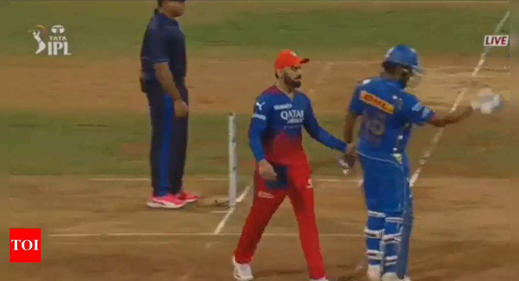 Watch: ‘Hi, Rohit!’ – Virat Kohli surprises Rohit Sharma with on-field greeting during MI vs RCB match | Cricket News – Times of India