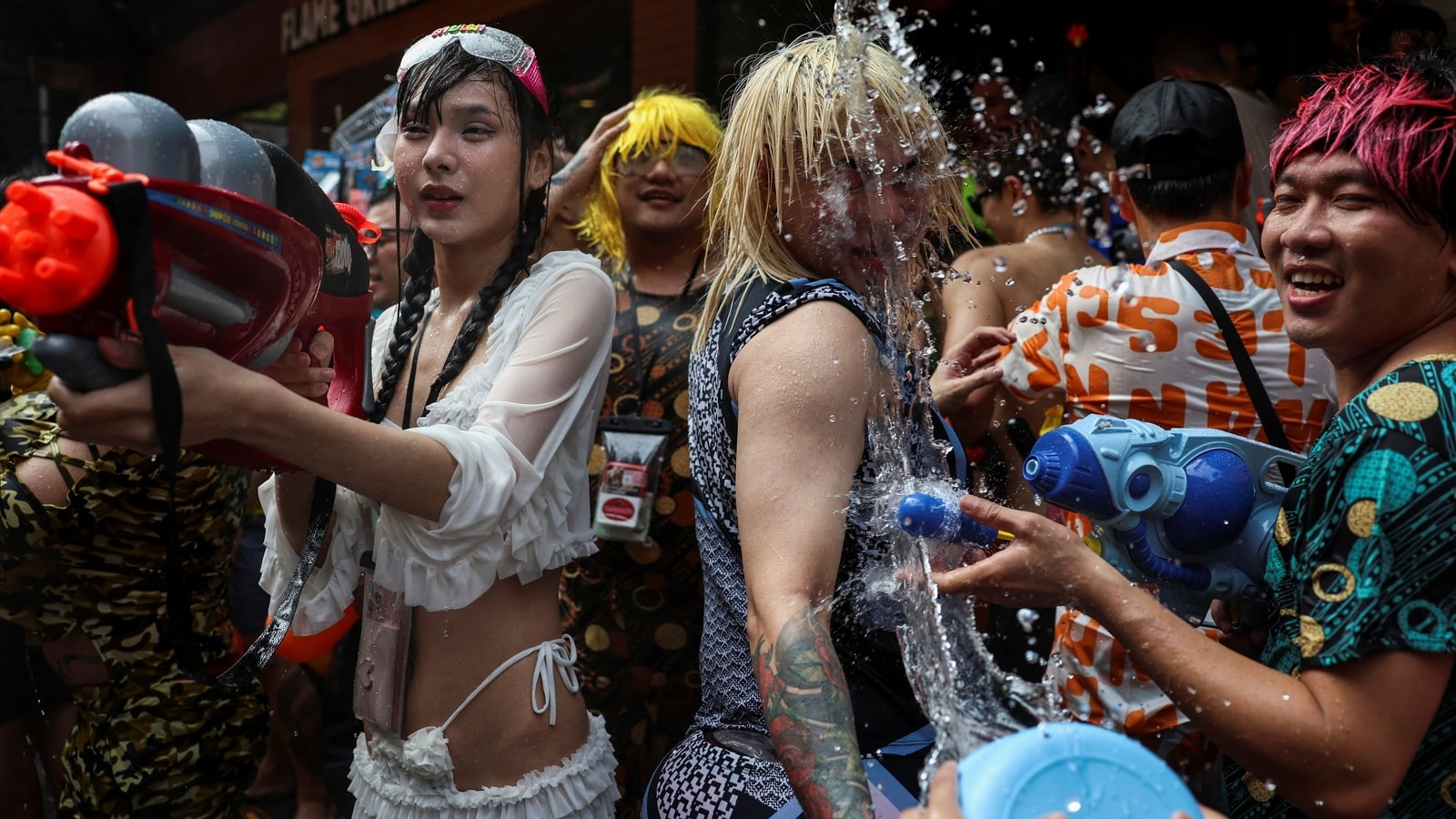 Water guns are in full blast to mark Thai New Year festivities despite worries about heat wave